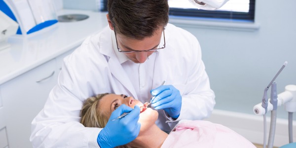 A dentist is a physician whose practice is in the field of dentistry. This involves the mouth, teeth, gums and related areas.