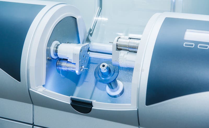 CAD CAM dental computer-aided machine in a highly modern dental laboratory for prosthesis and crowns milling. Dentistry, prostodon royalty free stock image