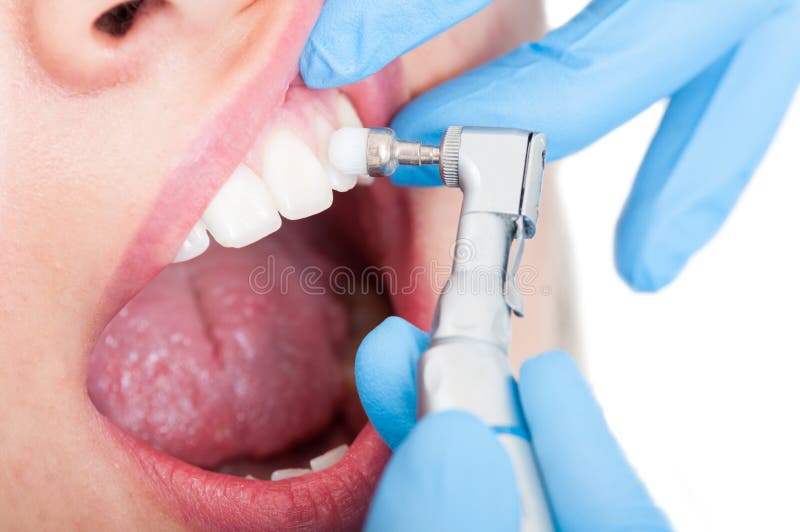 Close-up of young woman patient with female dentist stock photo