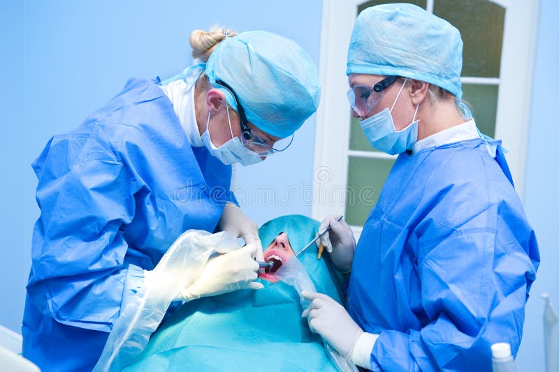 Dental implantation procedure stock photos