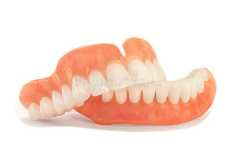 dentures. Isolate on white background acrylic prosthesis of human jaws. The concept of orthopedic dentistry royalty free stock photo