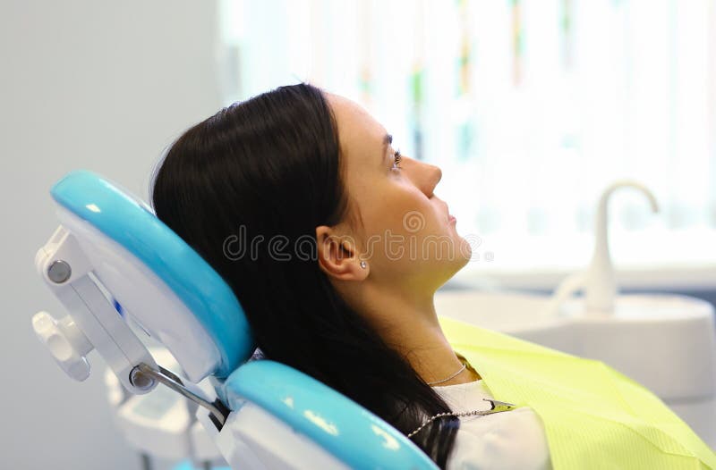 Healthy teeth patient at dentist office dental caries prevention royalty free stock image