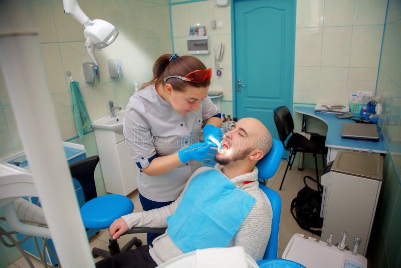 Healthy teeth patient at dentist office dental caries prevention royalty free stock photo