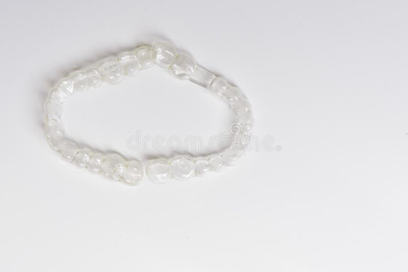 Invisible teeth dental tooth retainer aligner to straighten each tooth in orthodontics treatment for patients. stock images