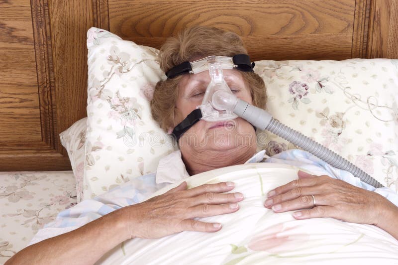 CPAP Sleep Apnea Machine, Senior Woman stock images