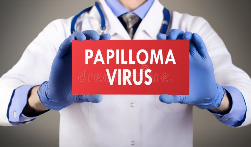 Papilloma virus. Doctor`s hands in blue gloves shows the word papilloma virus. Medical concept stock images