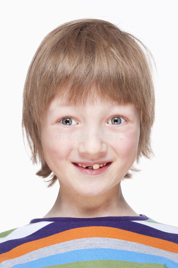 Portrait of a Boy with Milk Teeth Smiling stock photos