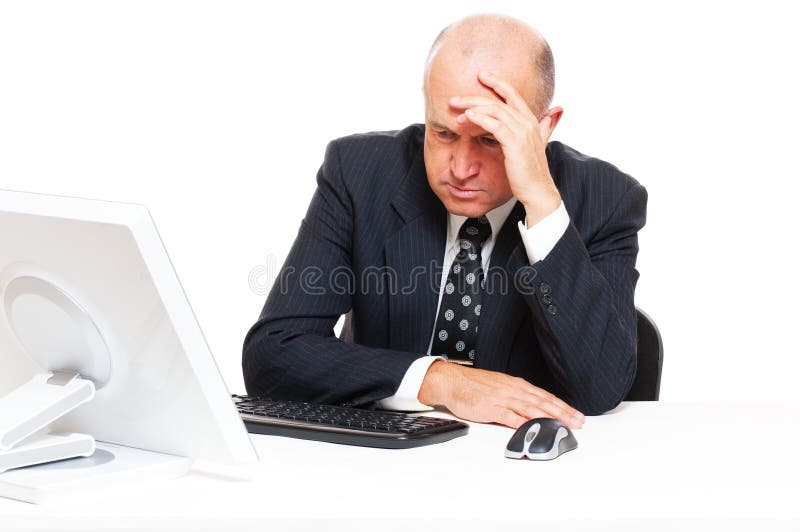 Sad businessman sitting in office stock photos