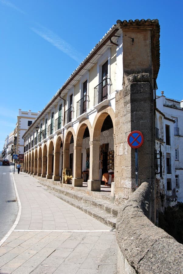 Wedge shaped building by the new bridge, Ronda, Spain. royalty free stock images