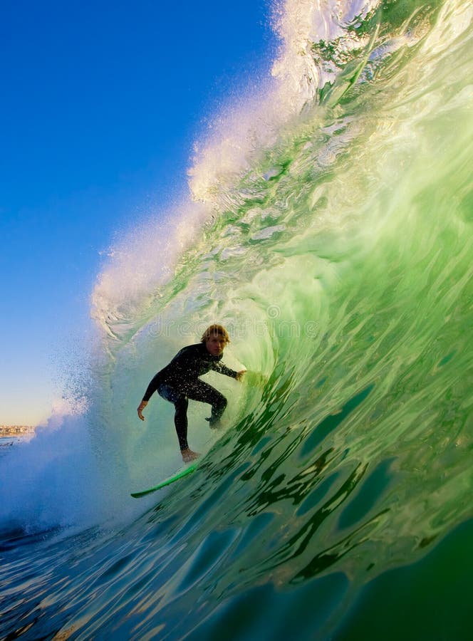 Surfer In The Tube Riding A Big Wave royalty free stock images