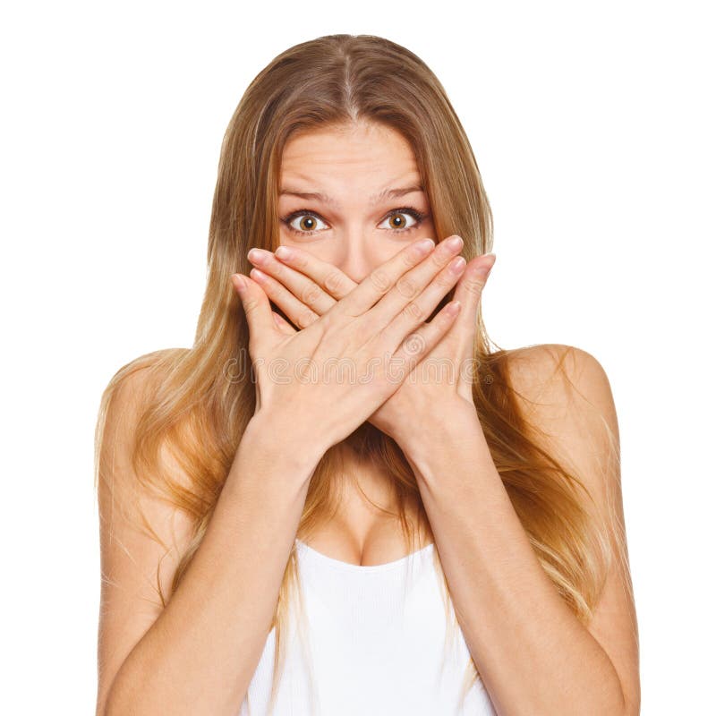 Surprised happy beautiful woman covering her mouth with hand. isolated over white royalty free stock images