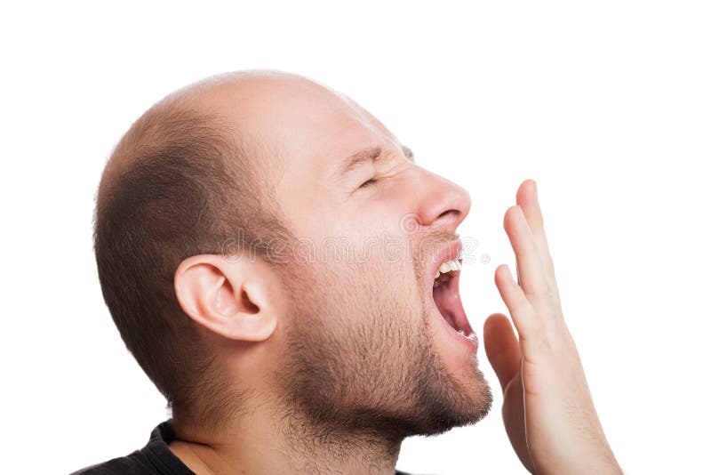 Tired man wide open mouth yawning stock photo