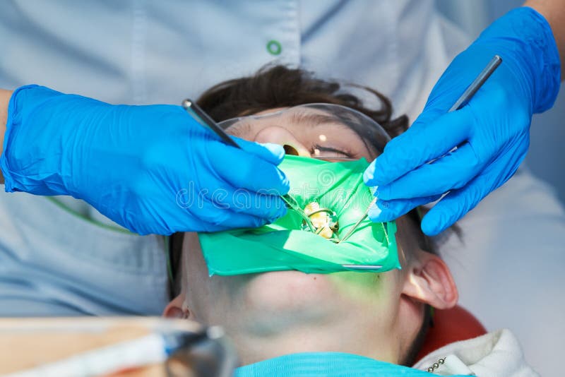 Tooth care and treatment. dentist work stock photo