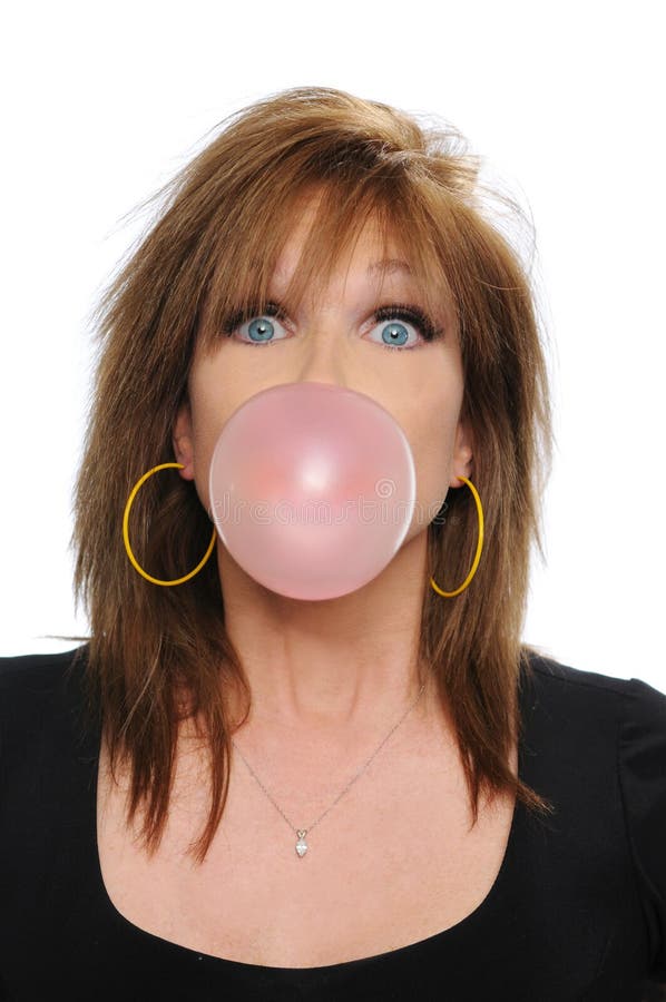Woman blowing bubble gum. Isolated on white royalty free stock photography