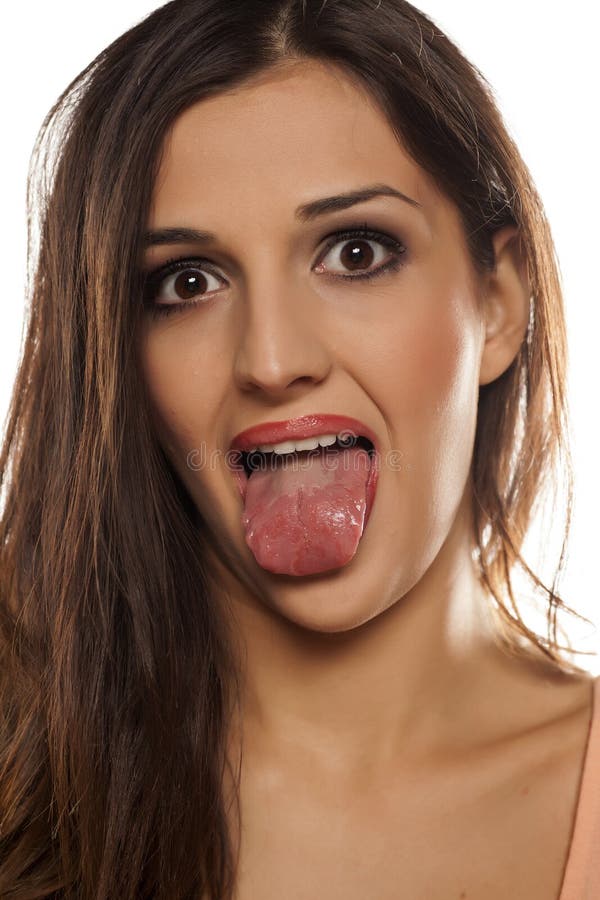 Woman showing her tongue royalty free stock photo