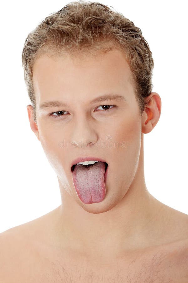 Young handsome man showing tongue royalty free stock photography