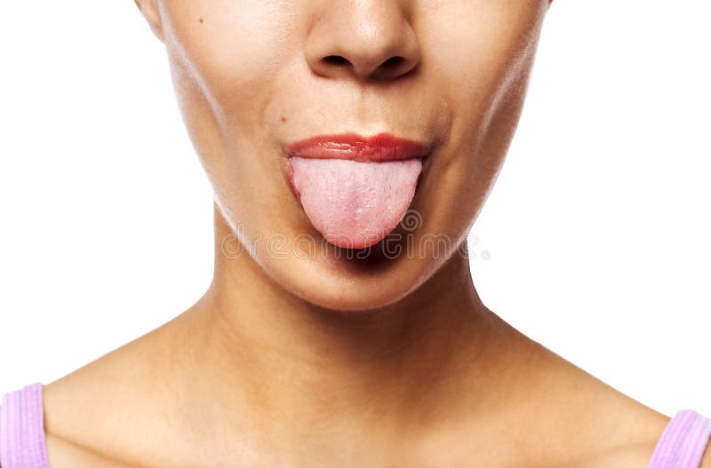 Young woman showing tongue royalty free stock image
